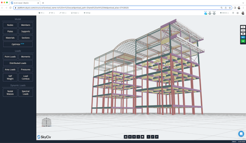 skyciv-structural-analysis-steel-frame-design-software-large-model-3-min-1-1-800×467.png 3D model of a multistory steel-frame building under construction, with colored beams and a grid floor